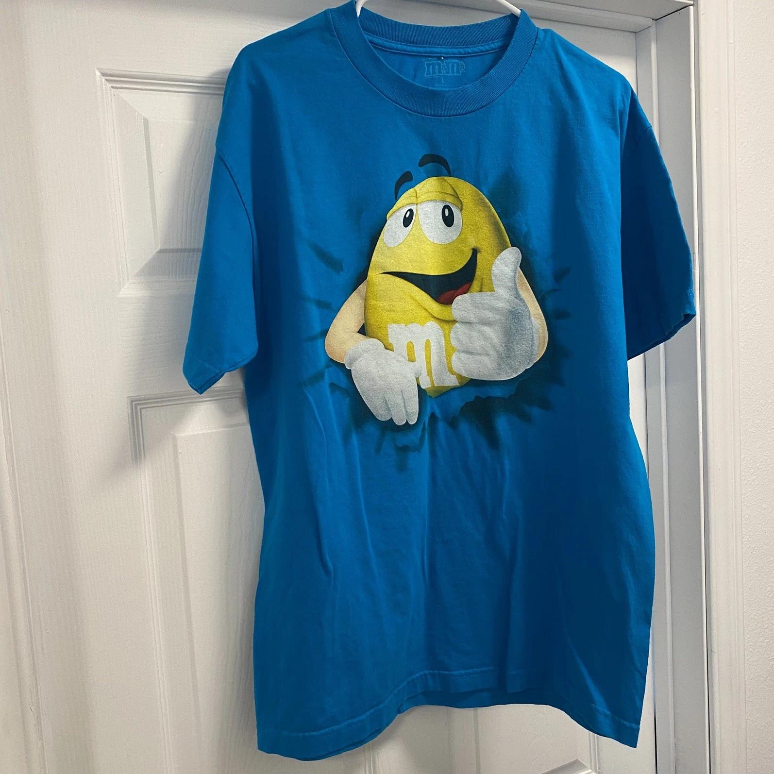 M&M s Yellow Peanut Thumbs Up Las Vegas Souvenir Candy T Shirt Men s sz Large 2XL
M&M s Yellow Peanut Thumbs Up Las Vegas Souvenir Candy T Shirt Men s sz Large 2XL