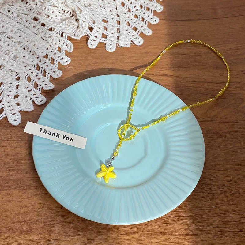 Ожерелье-подвеска из керамики и стеклянных бусин в виде морской звезды и раковины, универсальное, в отпускном стиле, цепочка до ключиц, нишевая мода, высококачественная бижутерия
Ожерелье-подвеска из керамики и стеклянных бусин в виде морской звезды и раковины, универсальное, в отпускном стиле, цепочка до ключиц, нишевая мода, высококачественная бижутерия