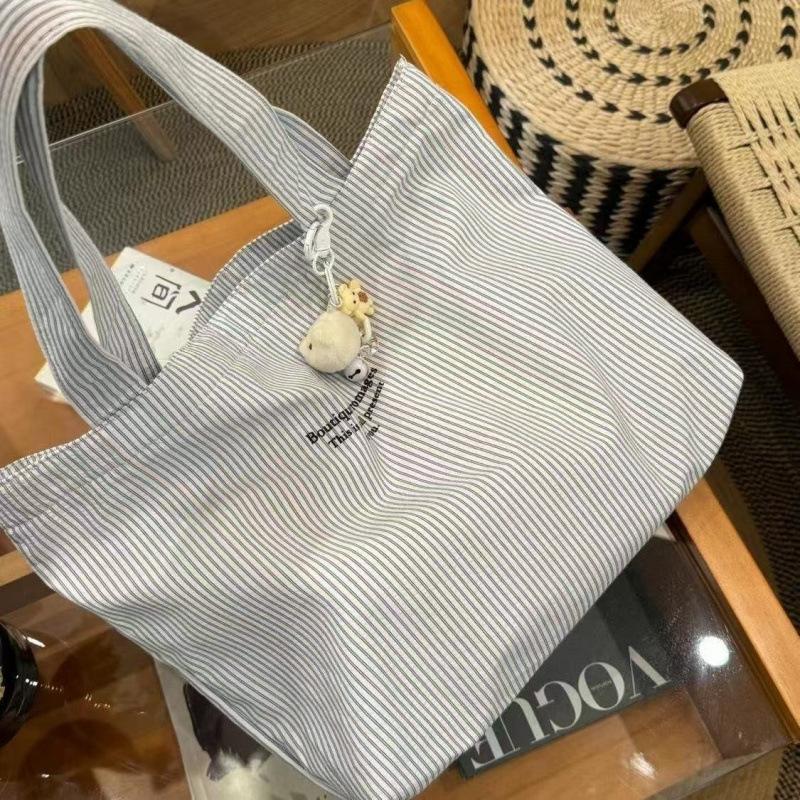 The new casual stripe is lazy and simple, and the large-capacity 2025 canvas bag is versatile and can be worn on one shoulder tote
The new casual stripe is lazy and simple, and the large-capacity 2025 canvas bag is versatile and can be worn on one shoulder tote