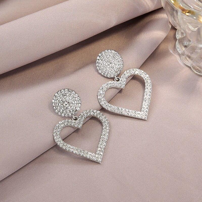 Korean Fashion Zircon Big Heart Shape Stud Earrings for Women Girls Wedding Party Statement Jewelry Accessories
Korean Fashion Zircon Big Heart Shape Stud Earrings for Women Girls Wedding Party Statement Jewelry Accessories