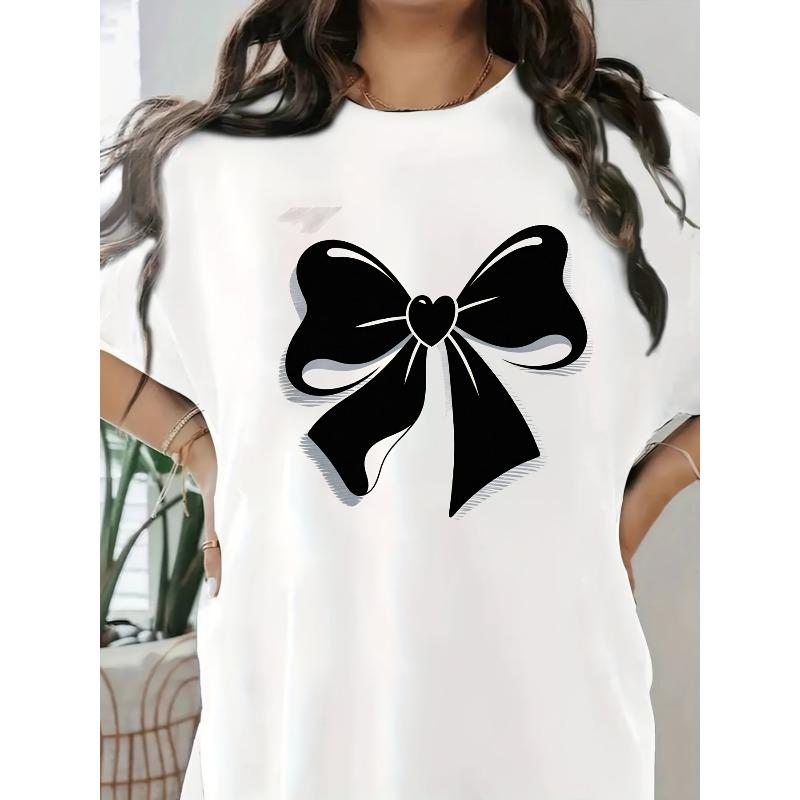 Ladies sporty T-shirt, featuring a striking large black bow and heart-shaped pattern. The 3D effect presents a white outline bow 4XL білий
Ladies sporty T-shirt, featuring a striking large black bow and heart-shaped pattern. The 3D effect presents a white outline bow 4XL білий