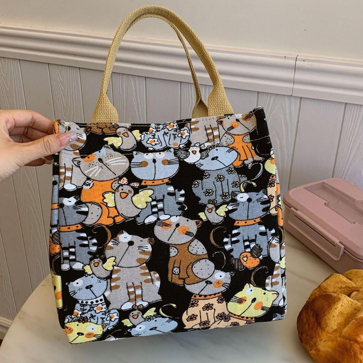 Cartoon printed fashion canvas handbag to work with rice lunch bag lunch box bag go out with baby handbag
Cartoon printed fashion canvas handbag to work with rice lunch bag lunch box bag go out with baby handbag