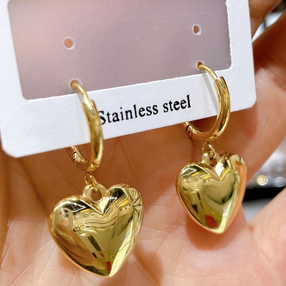 A pair of heart-shaped earring pendants made of stainless steel; fade-resistant and perfect for everyday wear by women
A pair of heart-shaped earring pendants made of stainless steel; fade-resistant and perfect for everyday wear by women