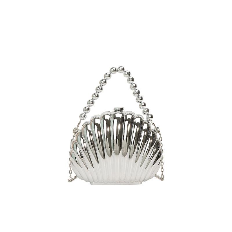 Mini shell shaped fashionable laser metal clutch, Y2K retro metal frame chain shoulder crossbody bag,suitable for going out
Mini shell shaped fashionable laser metal clutch, Y2K retro metal frame chain shoulder crossbody bag,suitable for going out