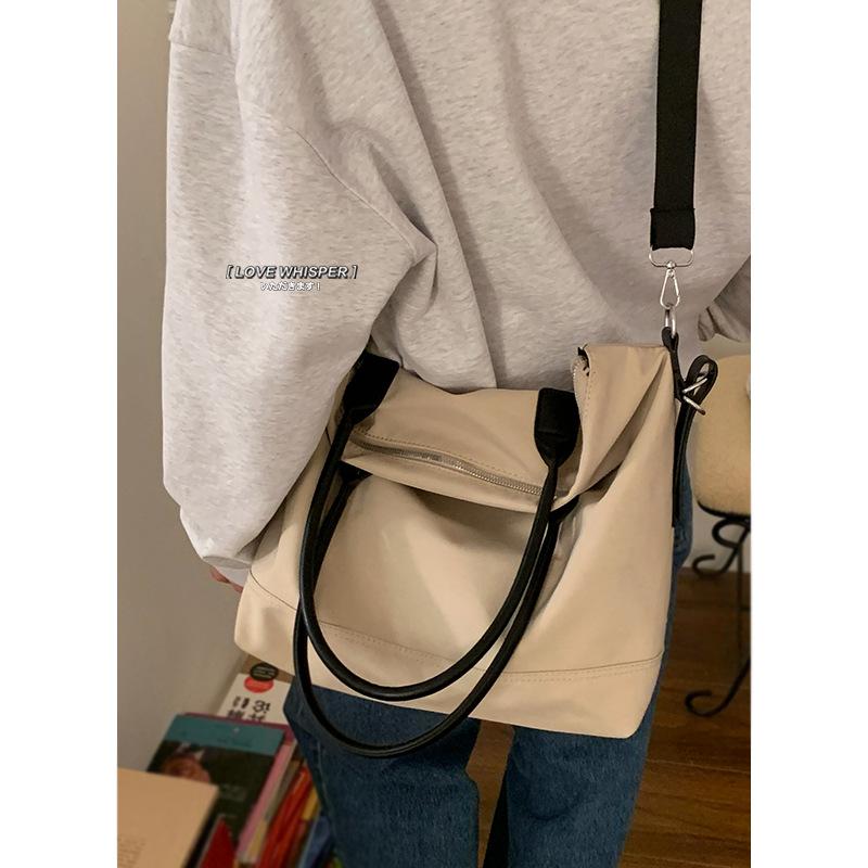 Casual large-capacity nylon bag women s 2025 new fashion simple college tote bag portable travel bag
Casual large-capacity nylon bag women s 2025 new fashion simple college tote bag portable travel bag