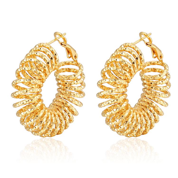 Trendy Women s 18K Gold Stainless Steel Hoop Earrings: European & American Fashion with Exaggerated Spring Design.
Trendy Women s 18K Gold Stainless Steel Hoop Earrings: European & American Fashion with Exaggerated Spring Design.