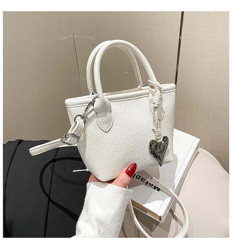 Портативная сумка-ведро лето новая нишевая трендовая повседневная сумка на плечо премиум сумка-мессенджер белый
Портативная сумка-ведро лето новая нишевая трендовая повседневная сумка на плечо премиум сумка-мессенджер белый