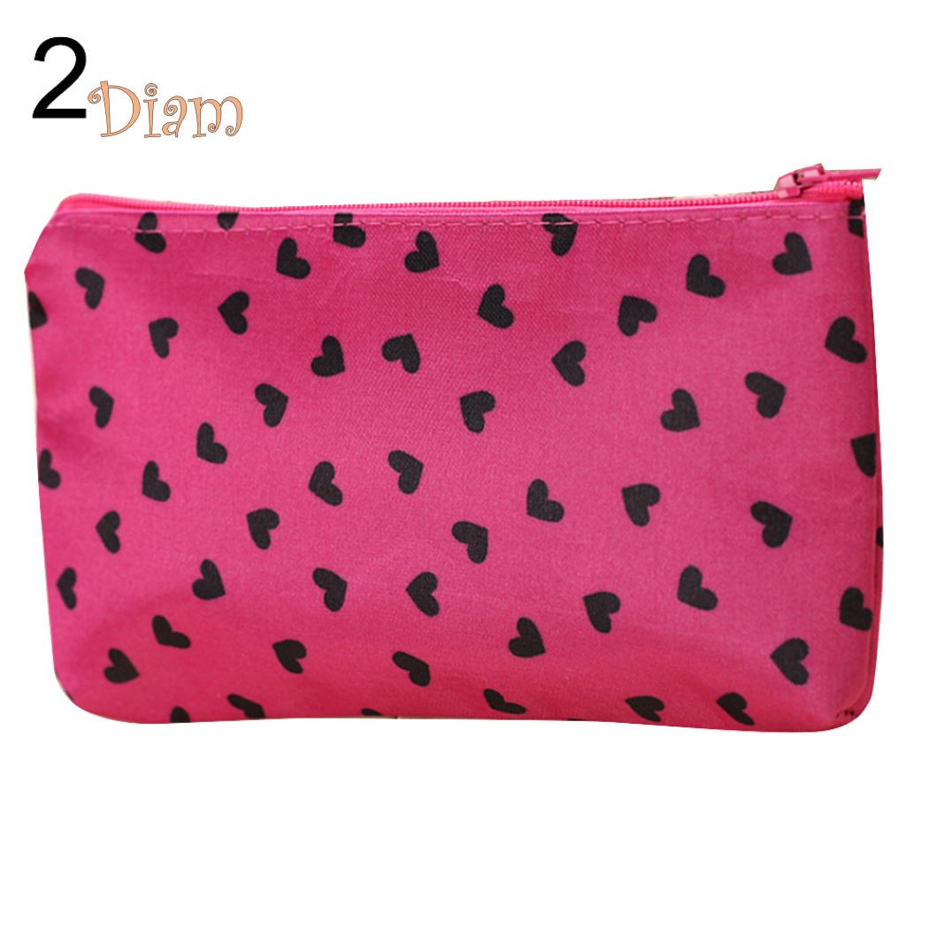 Портативная мини сумка из полиэстера на молнии и принтом в мелкое сердечко для косметических средств и макияжа 2#
Портативная мини сумка из полиэстера на молнии и принтом в мелкое сердечко для косметических средств и макияжа 2#