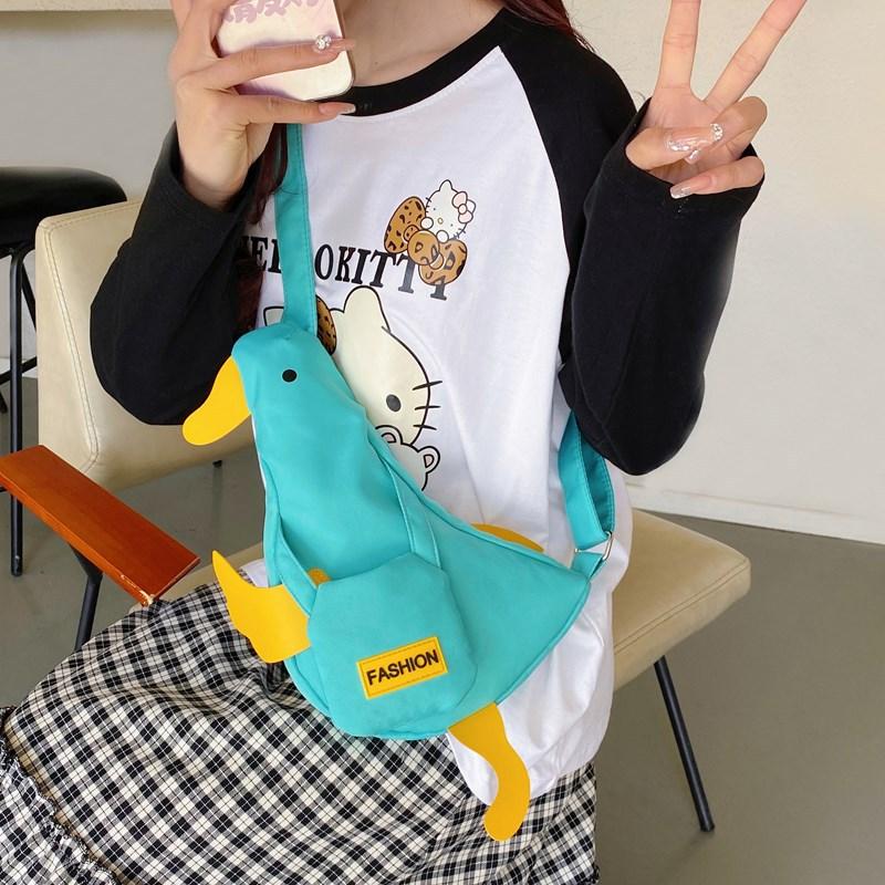 Cute duck funny backpack chest bag canvas bag versatile new mobile phone messenger bag student shoulder fanny pack чорний
Cute duck funny backpack chest bag canvas bag versatile new mobile phone messenger bag student shoulder fanny pack чорний