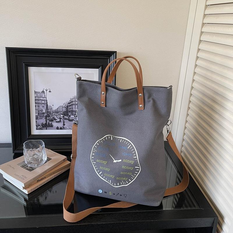 Fashi Korean Crossbody Bag Large Capacity Canvas Shoulder Tote Bag with Stylish Letter Print Design Simple Commuting Bag серый
Fashi Korean Crossbody Bag Large Capacity Canvas Shoulder Tote Bag with Stylish Letter Print Design Simple Commuting Bag серый