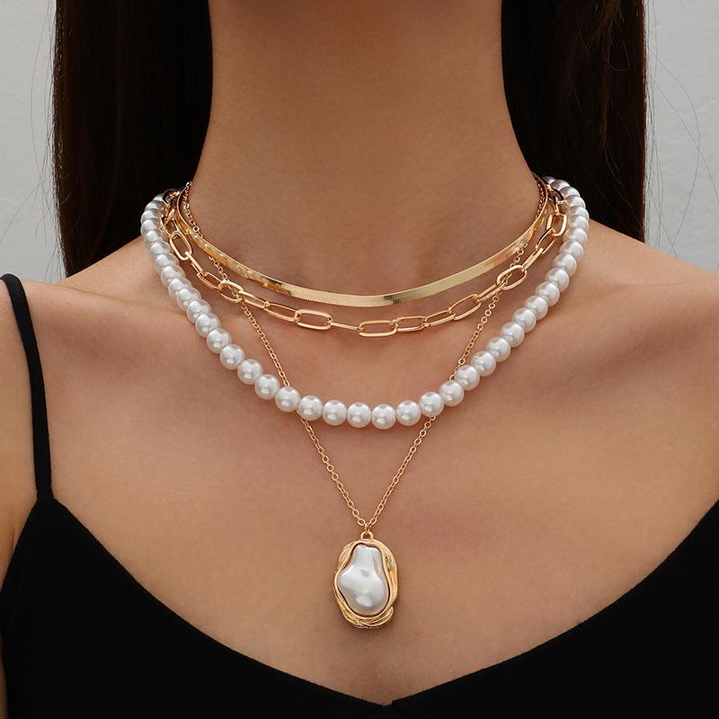 Retro metal snake bone chain, special-shaped imitation pearl necklace set, women s banquet and festival gift
Retro metal snake bone chain, special-shaped imitation pearl necklace set, women s banquet and festival gift