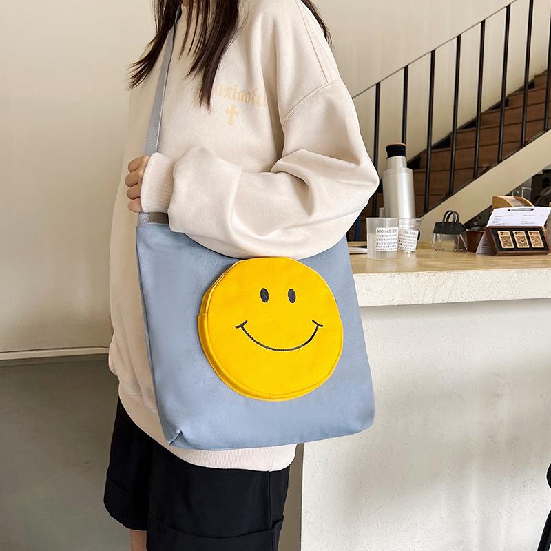 Large capacity canvas bag, student shopping bag, hand bag, college style smiley face printed canvas bag, tutoring bag рожевий
Large capacity canvas bag, student shopping bag, hand bag, college style smiley face printed canvas bag, tutoring bag рожевий