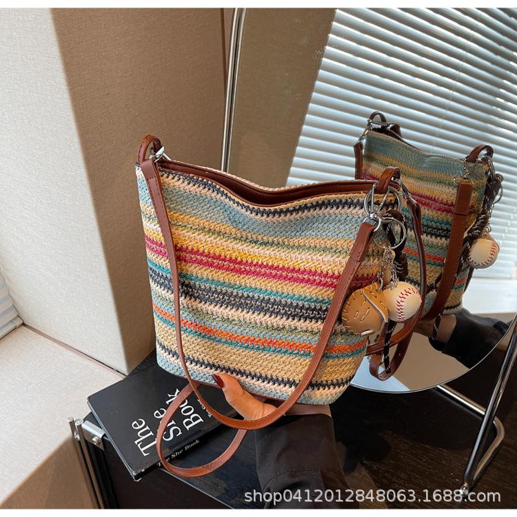 Niche design colorful striped woven bucket bag women s 2025 new fashion versatile foreign style shoulder messenger bag
Niche design colorful striped woven bucket bag women s 2025 new fashion versatile foreign style shoulder messenger bag