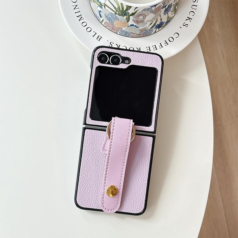 Applicable To Samsung Zflip6 Folding Leather Phone Case Findn3Flip Wristband Flip Xflip Solid Color Hard Case Huawei pocket2
Applicable To Samsung Zflip6 Folding Leather Phone Case Findn3Flip Wristband Flip Xflip Solid Color Hard Case Huawei pocket2