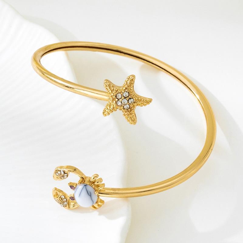 Single summer ocean wind inlaid synthetic zircon starfish turtle crab opening adjustable bracelet daily leisure
Single summer ocean wind inlaid synthetic zircon starfish turtle crab opening adjustable bracelet daily leisure