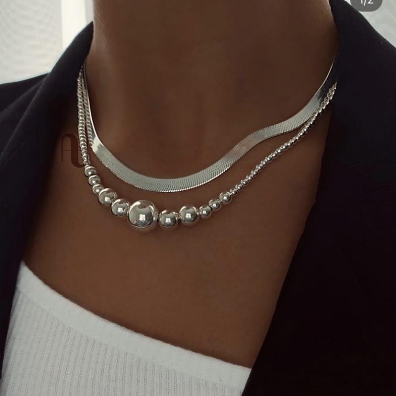 Minimalist Double-Layer Metal Beaded Clavicle Necklace – Retro High-End Design for Women
Minimalist Double-Layer Metal Beaded Clavicle Necklace – Retro High-End Design for Women