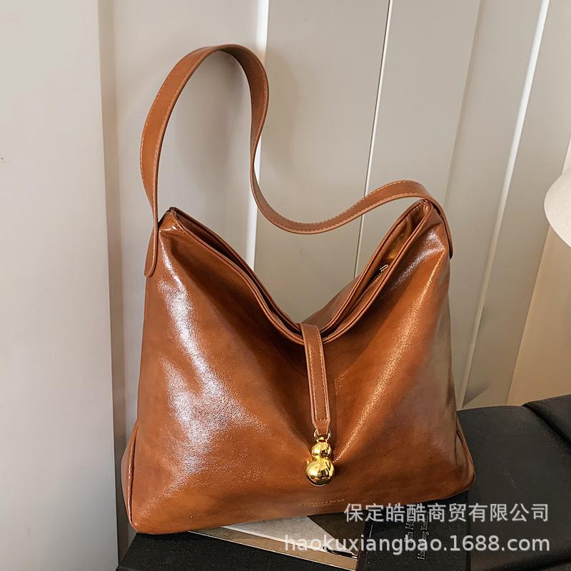 Premium sense bag women 2025 new shoulder bag large capacity tote bag commuter fashion messenger bag bucket bag коричневий
Premium sense bag women 2025 new shoulder bag large capacity tote bag commuter fashion messenger bag bucket bag коричневий