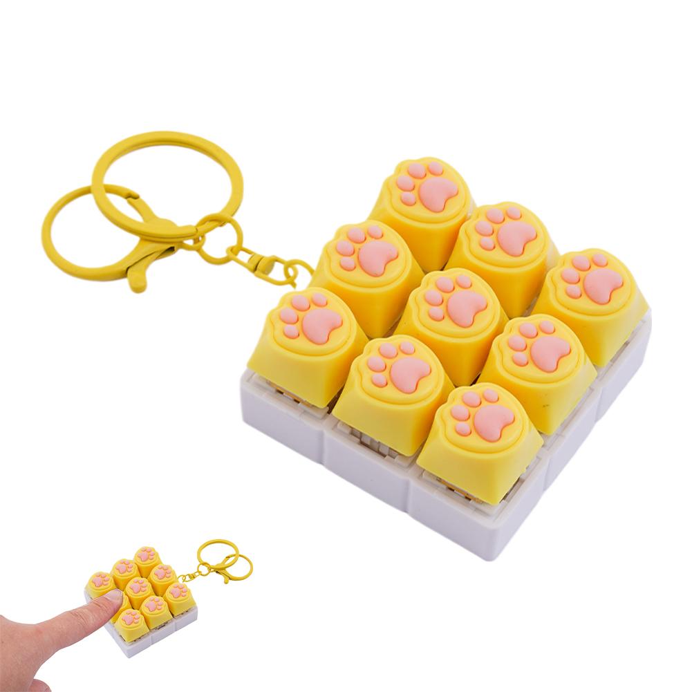 Cute Cat Paw Fidget Keyboard Keychain 9-Key Decompression Button Keychain Toys for Finger Squeeze Stress Relief Sensory Pendant
Cute Cat Paw Fidget Keyboard Keychain 9-Key Decompression Button Keychain Toys for Finger Squeeze Stress Relief Sensory Pendant