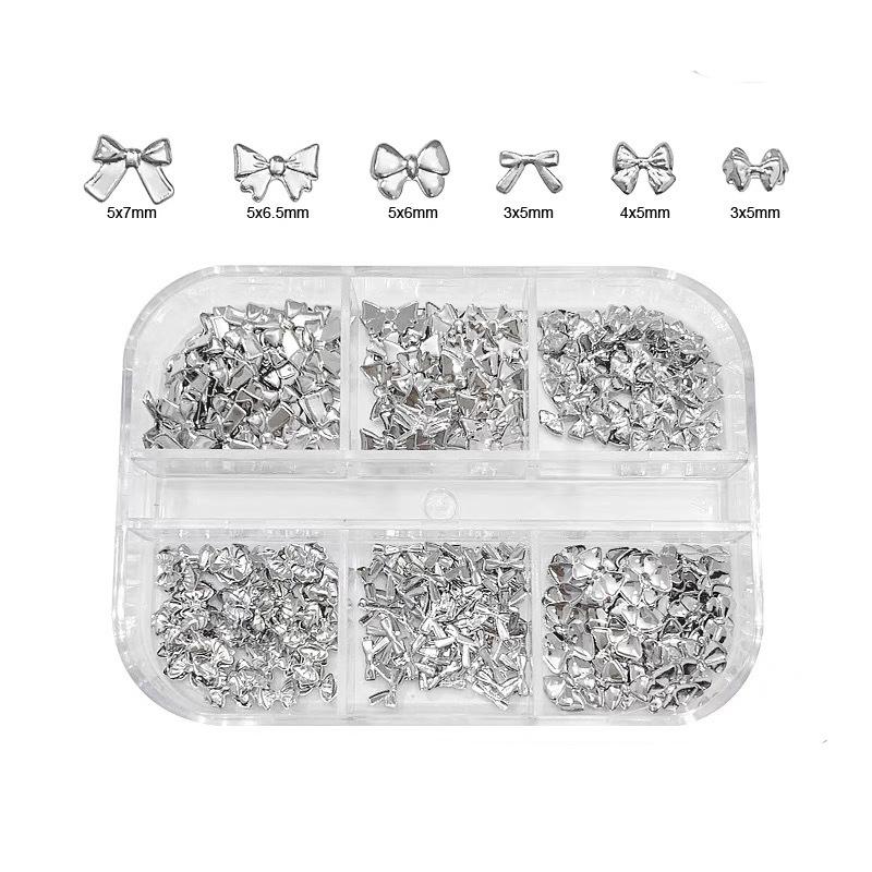 6 сеток/коробка смешанный сплав мини бант для ногтей подвески 3D бант украшения для ногтей аксессуары Diy серебряный
6 сеток/коробка смешанный сплав мини бант для ногтей подвески 3D бант украшения для ногтей аксессуары Diy серебряный