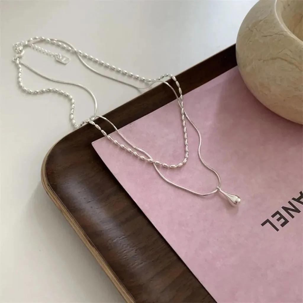 Charm Trendy Copper Color Beaded Double-deck Water Drop Pendant Necklace for Women Temperament Collar Zircon Korea Accessory медный
Charm Trendy Copper Color Beaded Double-deck Water Drop Pendant Necklace for Women Temperament Collar Zircon Korea Accessory медный