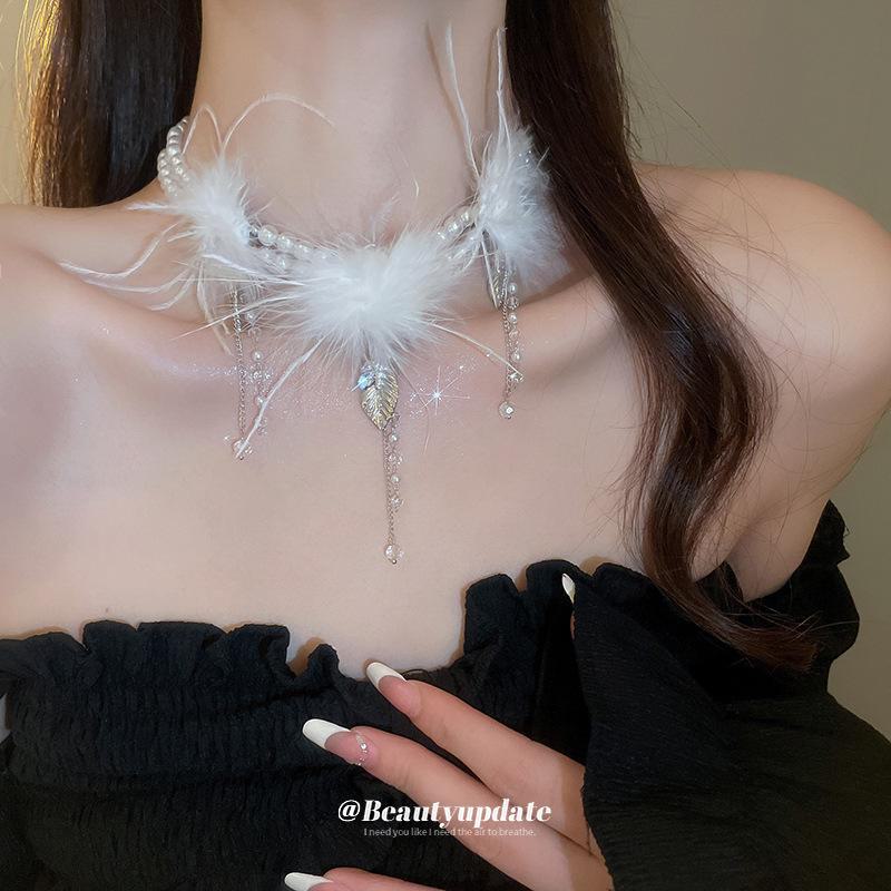 Leaf Feather Pearl Tassel Necklace - Double-Layer, Fashionable Clavicle Chain, Fairy-Tale Design for Women 6mm
Leaf Feather Pearl Tassel Necklace - Double-Layer, Fashionable Clavicle Chain, Fairy-Tale Design for Women 6mm