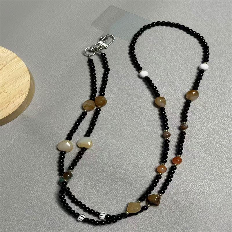 Сделанный вручную красочный бисерный ремешок-кроссбоди для телефона и камеры
Сделанный вручную красочный бисерный ремешок-кроссбоди для телефона и камеры