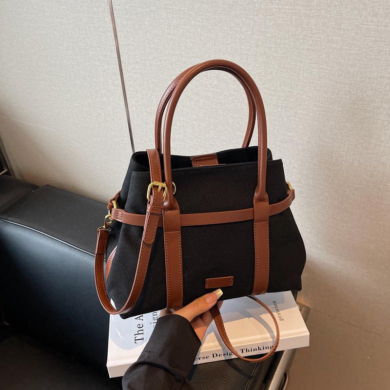 Retro commuter tote bucket bag female contrasting color new casual simple shoulder messenger bag
Retro commuter tote bucket bag female contrasting color new casual simple shoulder messenger bag