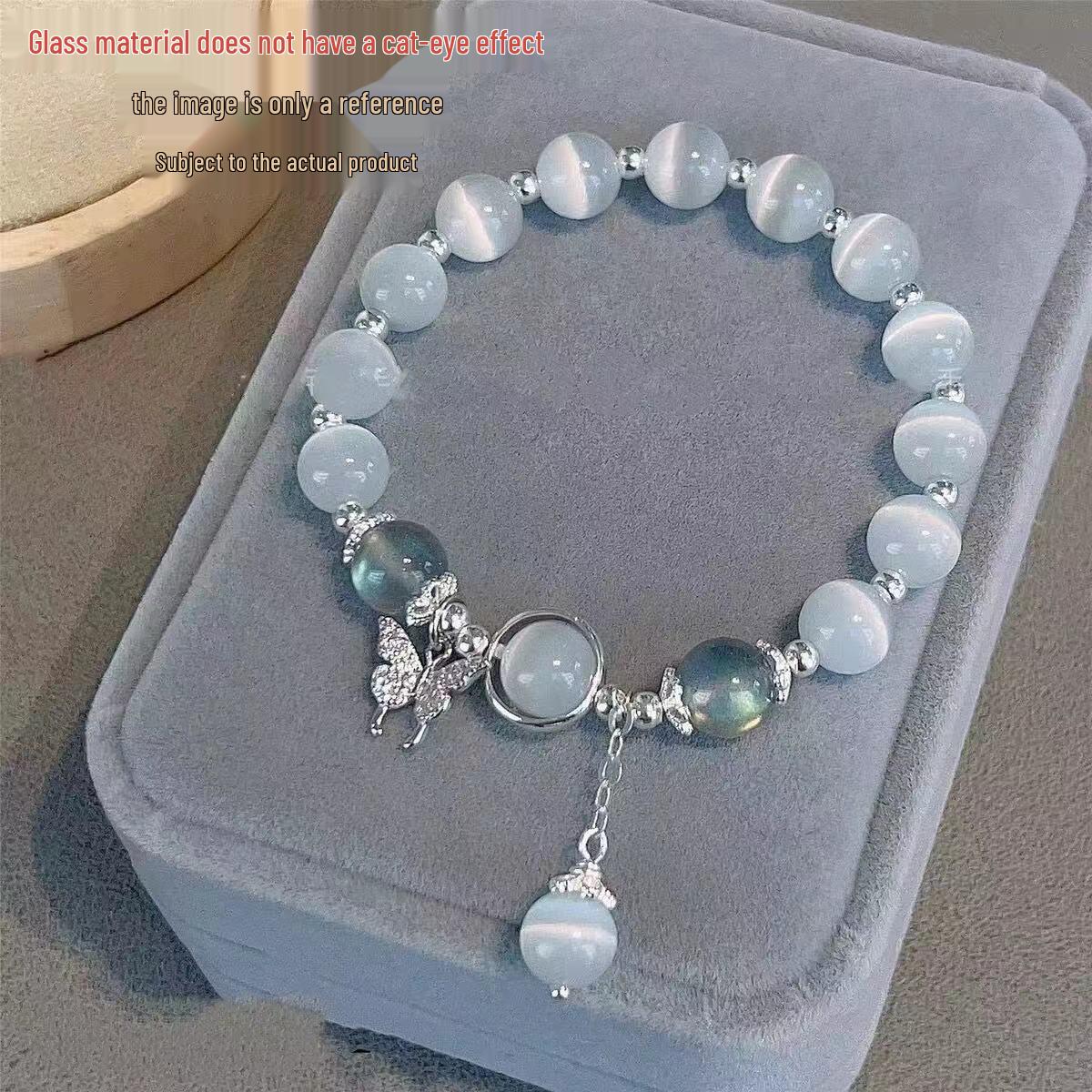 Women s Gray Moonlight Butterfly Bracelet: Trendy, Versatile, Niche Design with Imitation Cat s Eye for Students.
Women s Gray Moonlight Butterfly Bracelet: Trendy, Versatile, Niche Design with Imitation Cat s Eye for Students.