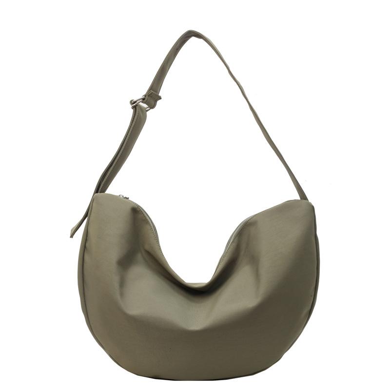 Повсякденні нейлонові приміські чоловічі та жіночі сумки великої місткості спортивні сумки через плече для пельменів зелений
Повсякденні нейлонові приміські чоловічі та жіночі сумки великої місткості спортивні сумки через плече для пельменів зелений