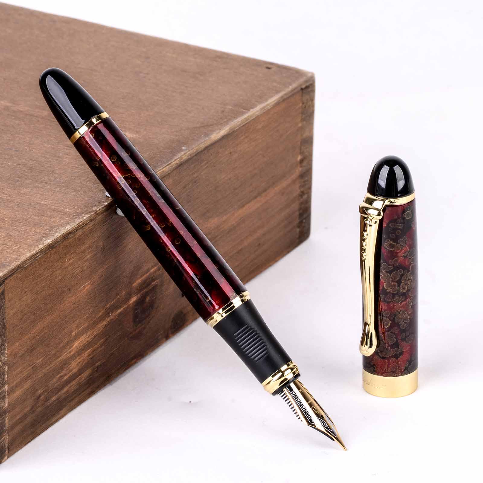 Винтажная перьевая ручка Peigu Jinhao X450 Red Ice Flower M, перо, подарок для каллиграфии
Винтажная перьевая ручка Peigu Jinhao X450 Red Ice Flower M, перо, подарок для каллиграфии