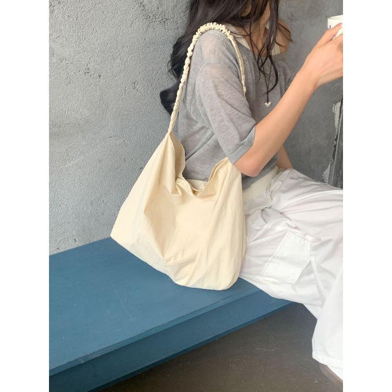 Нейлоновая сумка летняя женская повседневная сумка-тоут большой вместимости новая однотонная сумка через плечо для通勤 женщин бежевый
Нейлоновая сумка летняя женская повседневная сумка-тоут большой вместимости новая однотонная сумка через плечо для通勤 женщин бежевый