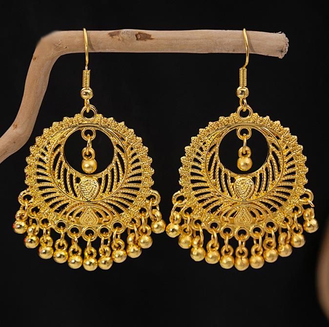 Серьги-колокольчики с кисточками в виде павлина и подвеской в виде листа в стиле бохо
Серьги-колокольчики с кисточками в виде павлина и подвеской в виде листа в стиле бохо