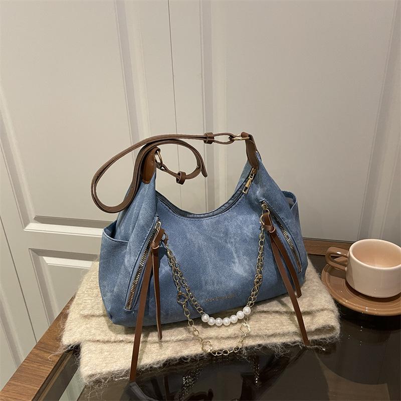 Women s bag new trendy versatile casual large-capacity pearl chain texture shoulder tote bag синій
Women s bag new trendy versatile casual large-capacity pearl chain texture shoulder tote bag синій