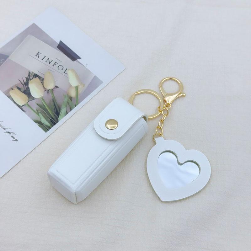 Red Leather Heart-Shaped Keychain with Mirror & PVC Pendant
Red Leather Heart-Shaped Keychain with Mirror & PVC Pendant