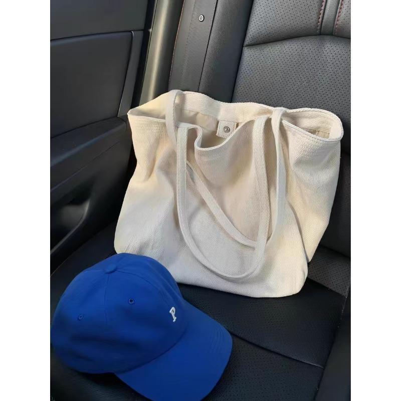 Shoulder bag Canvas bag Large capacity commuter messenger bag Tote bag New shoulder bag Niche light luxury high sense
Shoulder bag Canvas bag Large capacity commuter messenger bag Tote bag New shoulder bag Niche light luxury high sense