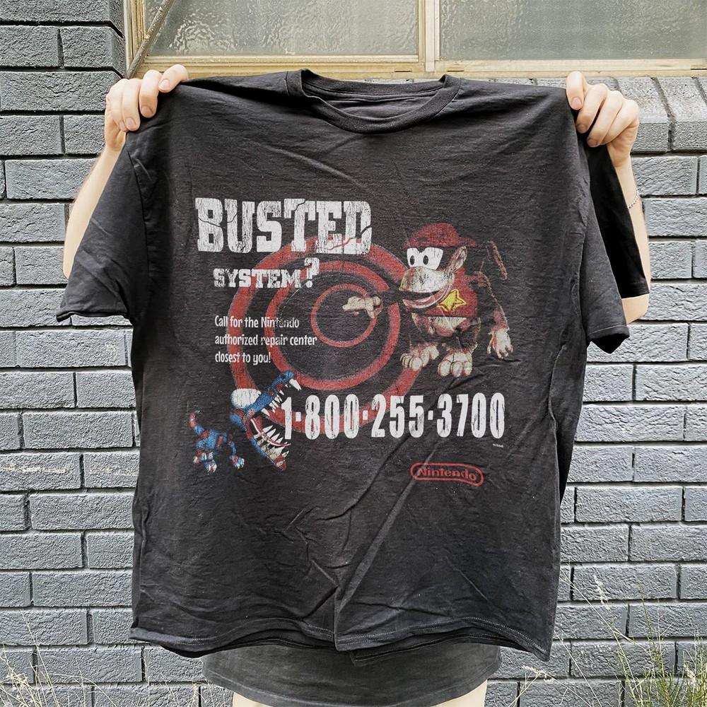 95 Nintendo Busted Systems Rare Employee Vintage Washed Black T-Shirt Mens Large Unisex T-Shirt L
95 Nintendo Busted Systems Rare Employee Vintage Washed Black T-Shirt Mens Large Unisex T-Shirt L