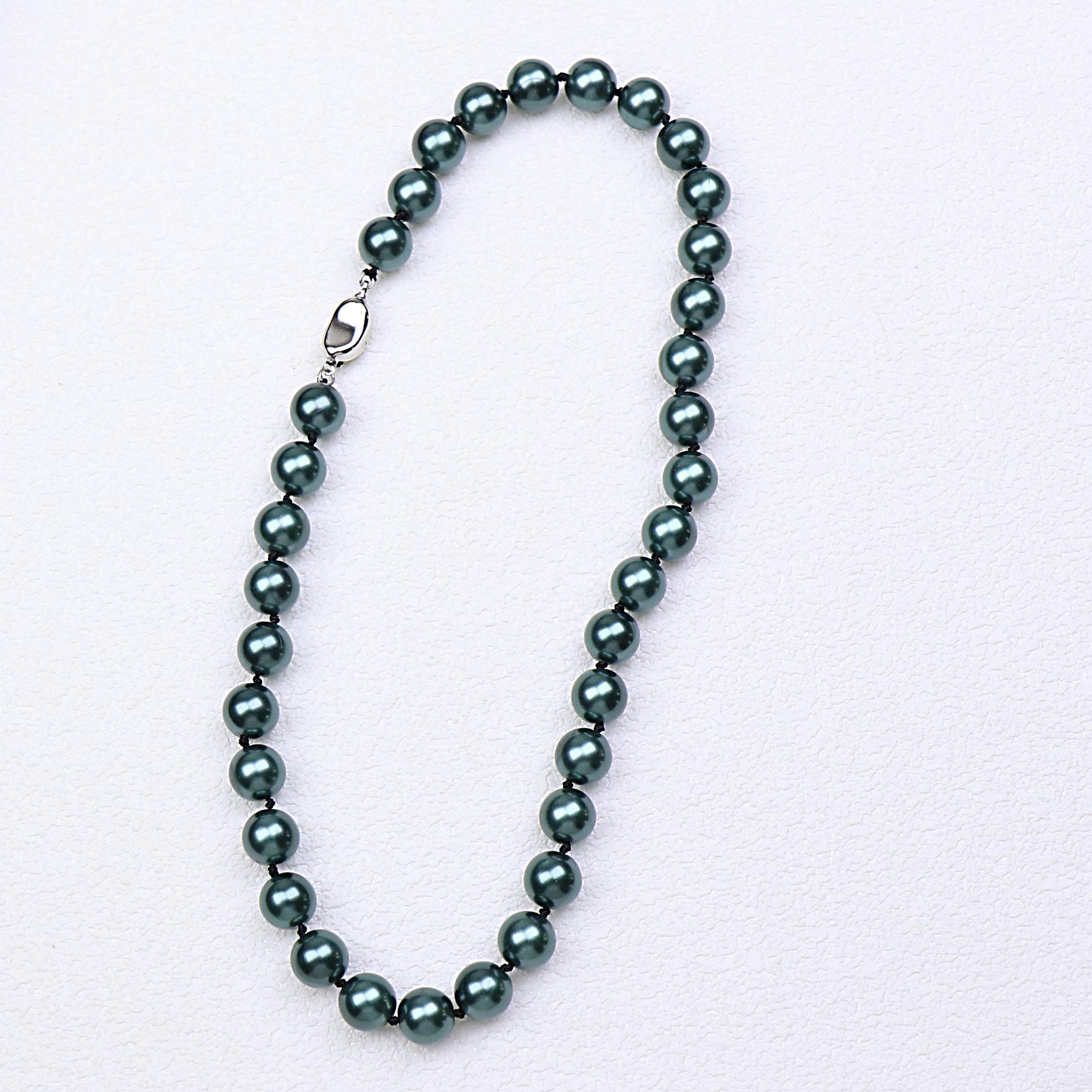 Таитянское павлинье-зеленое ожерелье из 10-мм ракушечного жемчуга для женщин - Элегантное, универсальное, легкое роскошное ожерелье-цепочка для ключицы с узлами из жемчуга
Таитянское павлинье-зеленое ожерелье из 10-мм ракушечного жемчуга для женщин - Элегантное, универсальное, легкое роскошное ожерелье-цепочка для ключицы с узлами из жемчуга