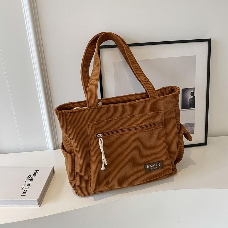 Simple Corduroy Tote Bag Large Capacity Solid Color Shoulder Bag Retro Multi Pockets Handbag for School Work Shopping коричневий
Simple Corduroy Tote Bag Large Capacity Solid Color Shoulder Bag Retro Multi Pockets Handbag for School Work Shopping коричневий