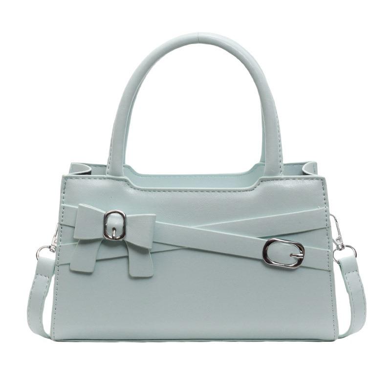 Textured bow handbag bag women s spring and summer new women s shoulder messenger bag contrasting color small square bag синій
Textured bow handbag bag women s spring and summer new women s shoulder messenger bag contrasting color small square bag синій
