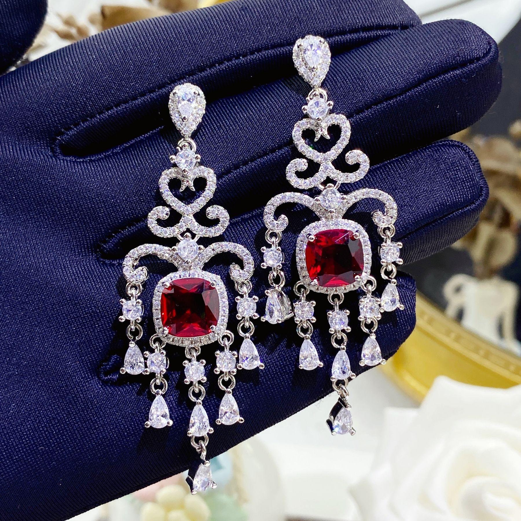 Elegant Bohemian Diamond Stud Earrings with Pigeon Blood Ruby Tassels - Perfect for Weddings and Parties
Elegant Bohemian Diamond Stud Earrings with Pigeon Blood Ruby Tassels - Perfect for Weddings and Parties