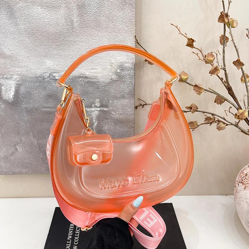 Fashion Half Moon Shoulder Bag For Women 2025 Summer Waterproof PVC Transparent Crossbody Bag 8 Colors Jelly Mobile Phone Purse 30cm)) зніміть рожевого кольору
Fashion Half Moon Shoulder Bag For Women 2025 Summer Waterproof PVC Transparent Crossbody Bag 8 Colors Jelly Mobile Phone Purse 30cm)) зніміть рожевого кольору