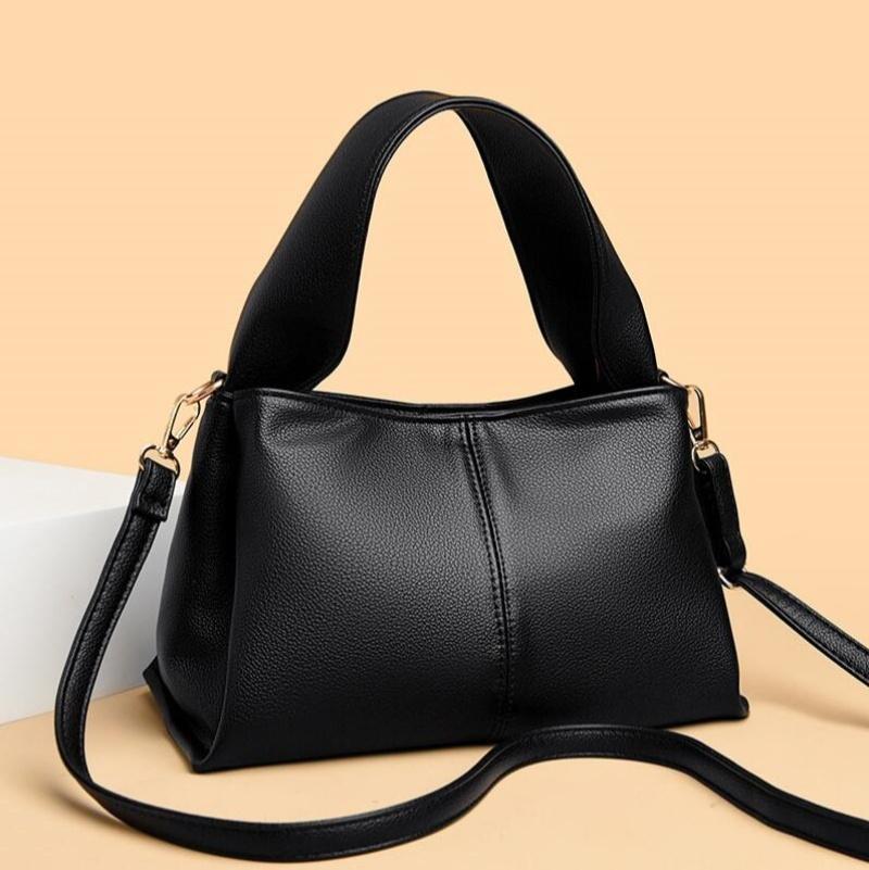 New Women s Classic Luxury Solid Color Designer Leather Handbag Crossbody Top-handle Bag Elegant Ladies Purse Bolso 28X15X18CM чёрный
New Women s Classic Luxury Solid Color Designer Leather Handbag Crossbody Top-handle Bag Elegant Ladies Purse Bolso 28X15X18CM чёрный
