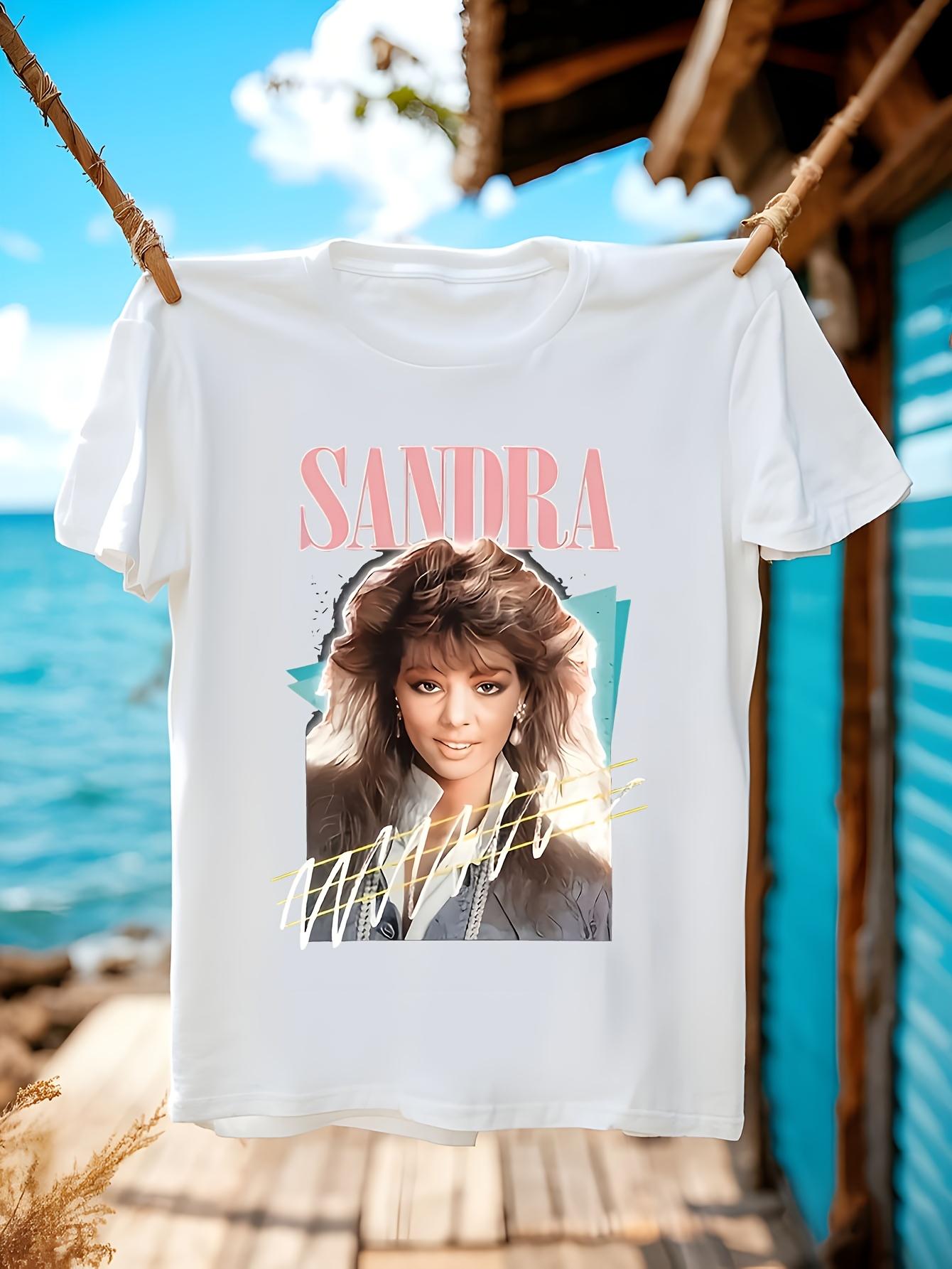 Vintage Sandra Cretu Graphic T-shirt - White Retro 80s Music Tee with Pink Lettering XXXXL
Vintage Sandra Cretu Graphic T-shirt - White Retro 80s Music Tee with Pink Lettering XXXXL