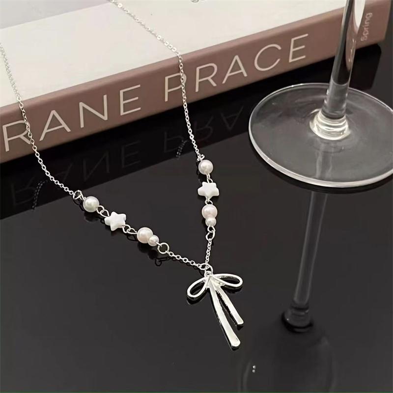 Copper Color Chain Bowknot Pendants Women s Necklaces White Acrylic Star Pendants Hollow Bow knot Drop Long Chain Necklace
Copper Color Chain Bowknot Pendants Women s Necklaces White Acrylic Star Pendants Hollow Bow knot Drop Long Chain Necklace