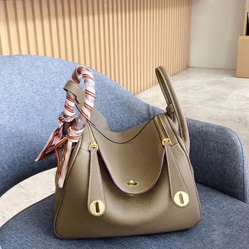 Togo first layer cowhide bag 2025 new lychee pattern leather bucket bag single shoulder crossbody portable women s bag Small
Togo first layer cowhide bag 2025 new lychee pattern leather bucket bag single shoulder crossbody portable women s bag Small