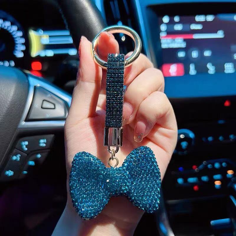 Shiny Crystal Bow Keychain, Cute Cartoon Multi-color Bow Handbag Pendant, Jewelry Accessory for Fashion. синий
Shiny Crystal Bow Keychain, Cute Cartoon Multi-color Bow Handbag Pendant, Jewelry Accessory for Fashion. синий