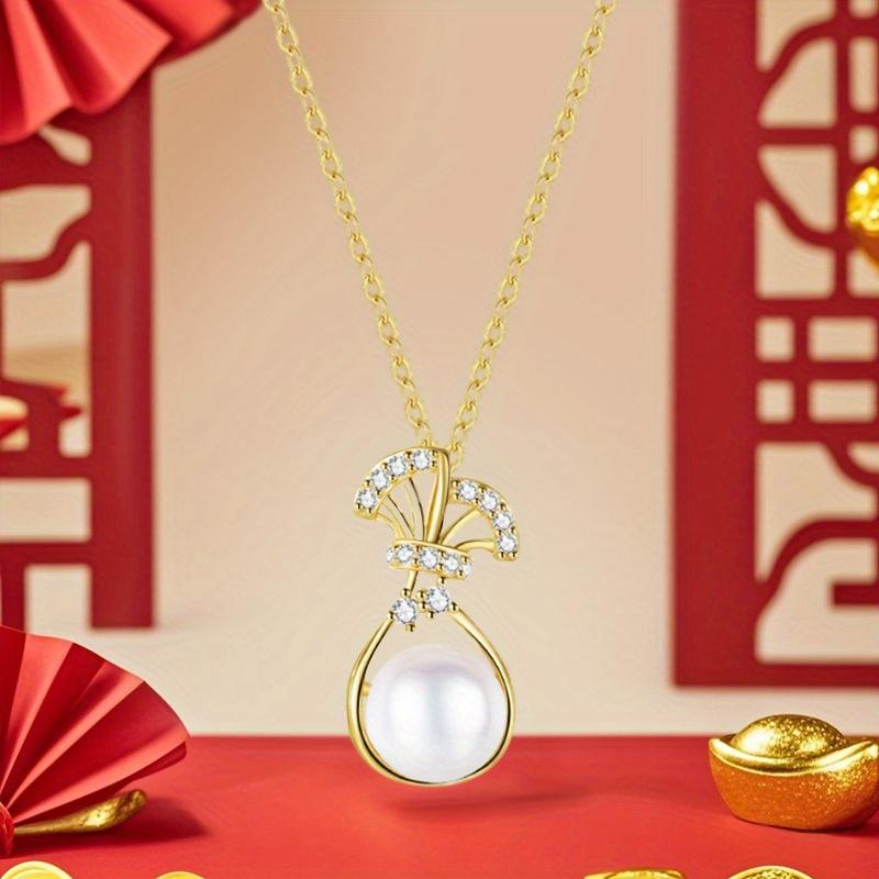 1 шт. Модное ожерелье с дизайном мешочка удачи из синтетического циркона, изысканное украшение с имитацией жемчуга золотой
1 шт. Модное ожерелье с дизайном мешочка удачи из синтетического циркона, изысканное украшение с имитацией жемчуга золотой