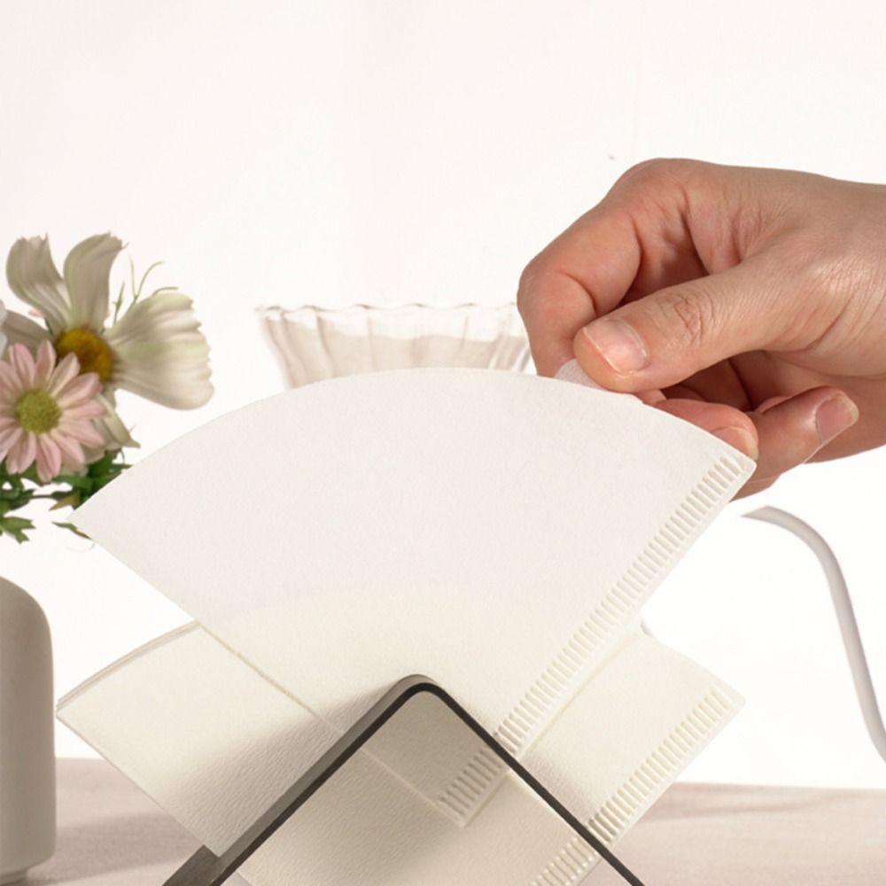100Pcs Disposable V-shaped Coffee Filter Paper 1-4 Servings with Handle Hand-brewed Coffee Paper Natural Wood Pulp No Odor
100Pcs Disposable V-shaped Coffee Filter Paper 1-4 Servings with Handle Hand-brewed Coffee Paper Natural Wood Pulp No Odor
