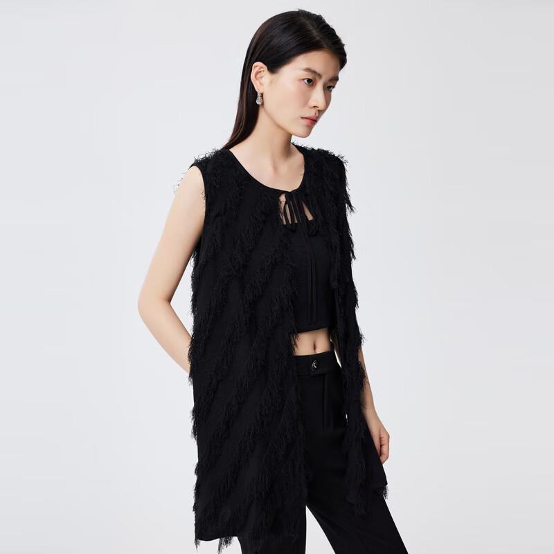 Вязаный кардиган-жилет с кисточками M
Вязаный кардиган-жилет с кисточками M