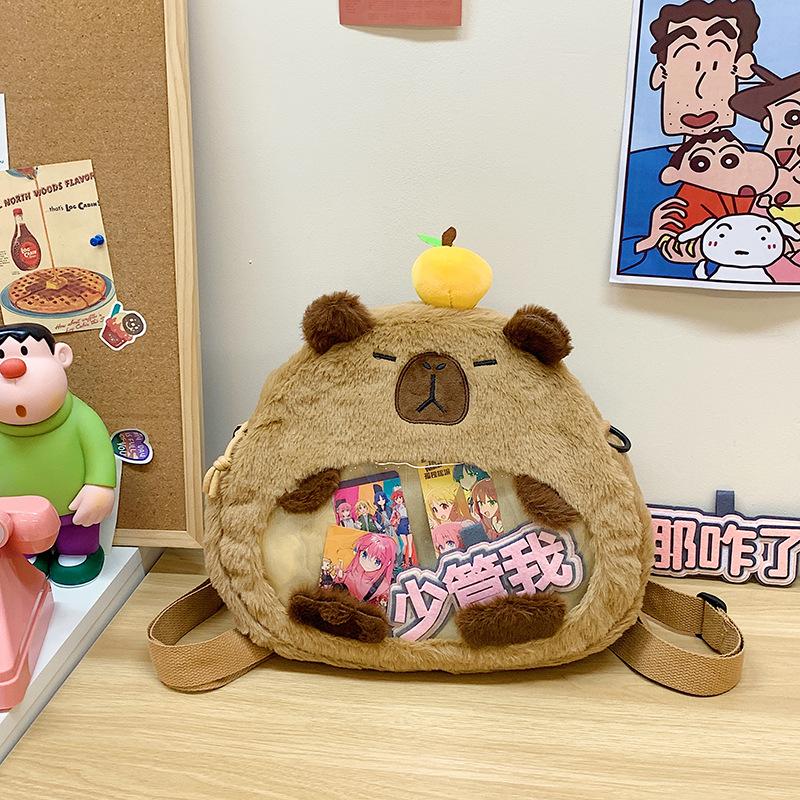 Двусторонний рюкзак для девочки с прозрачной капибарой, очень милый, большой вместимости коричневый
Двусторонний рюкзак для девочки с прозрачной капибарой, очень милый, большой вместимости коричневый